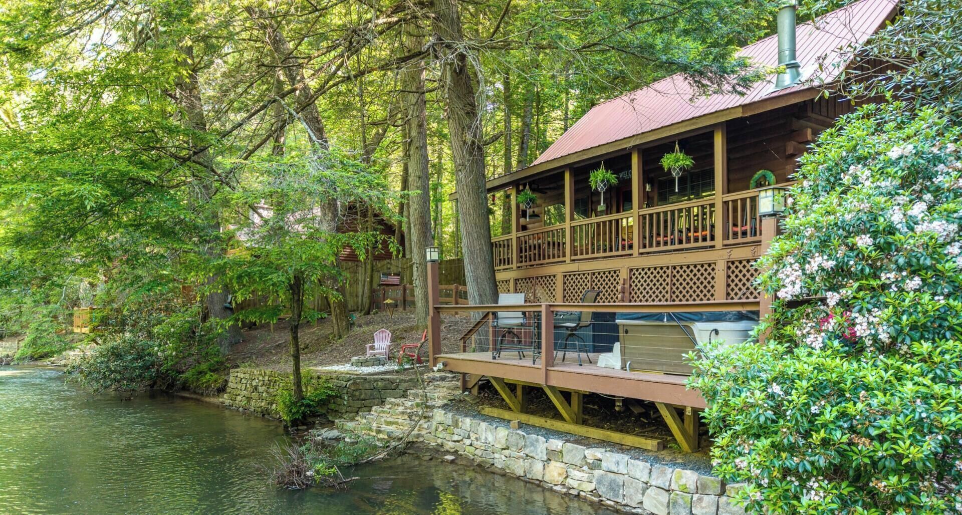 River Solace's deck and covered porch right on the bank of the Ellijay River